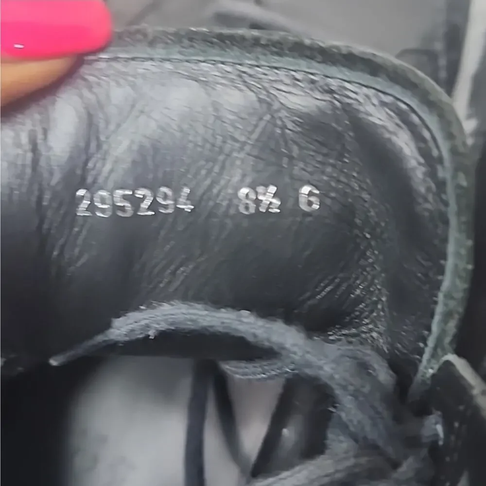 gucci black leather Laceup sneakers, with GG logo and cherry line on the side.